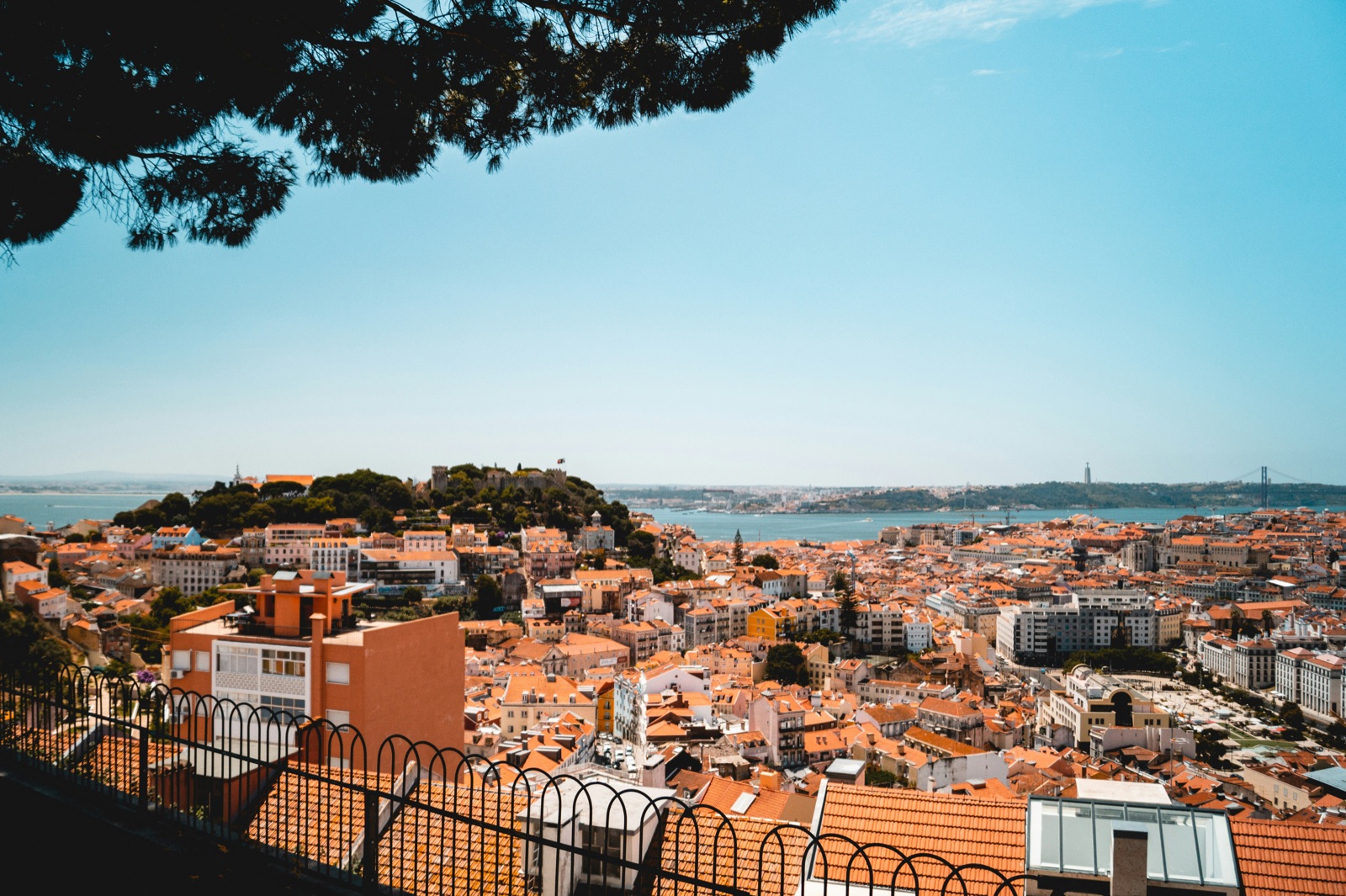Rua Augusta arch and Baixa rooftops, Lisbon, Portugal